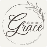 a white square with black text and a leaf