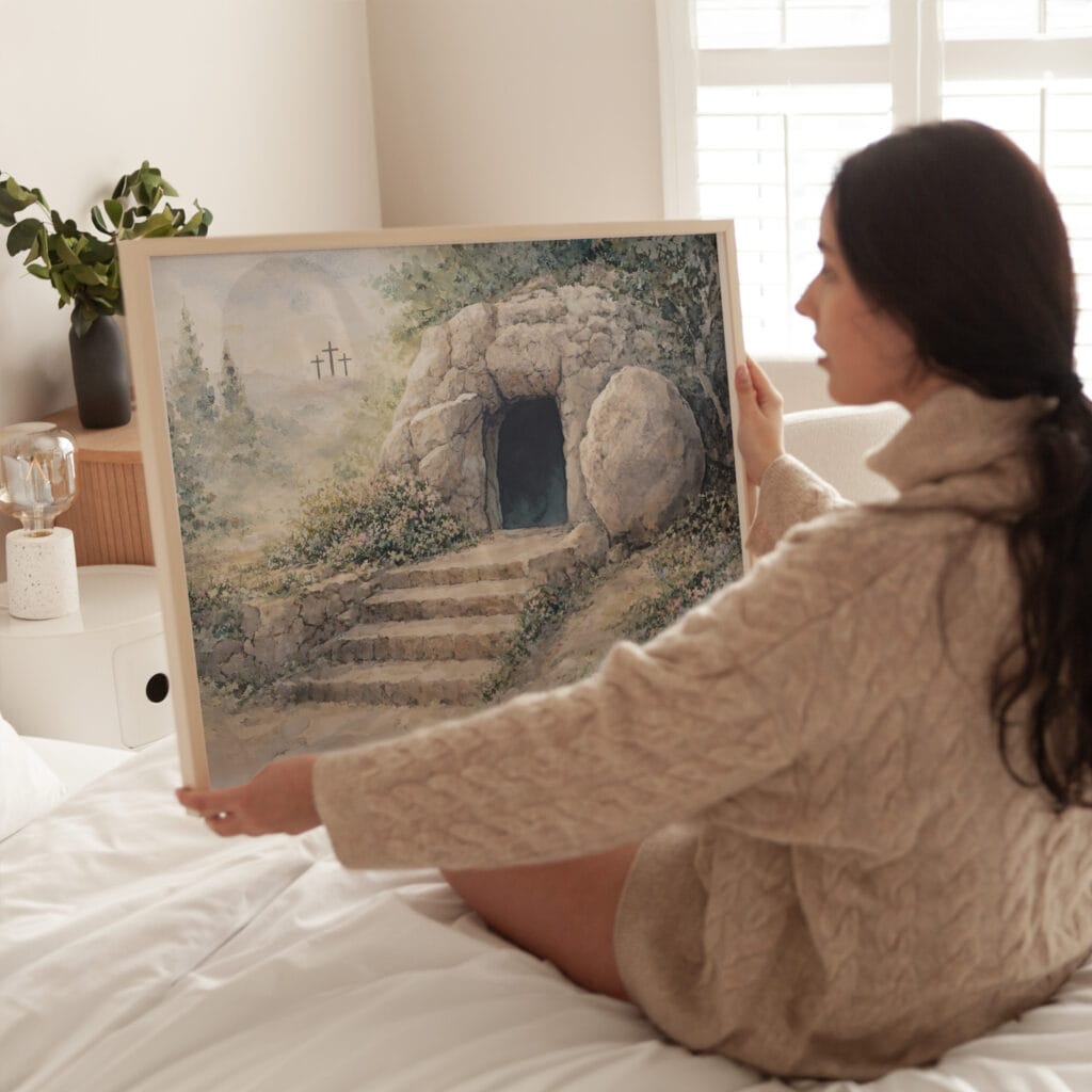 Christian wall art displayed in a neutral living room, featuring a framed Scripture-inspired landscape print.